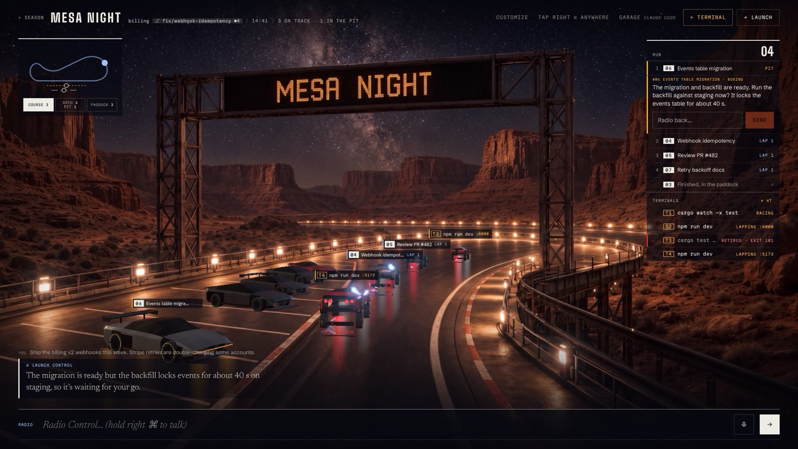 Cars racing around the Mesa Night circuit