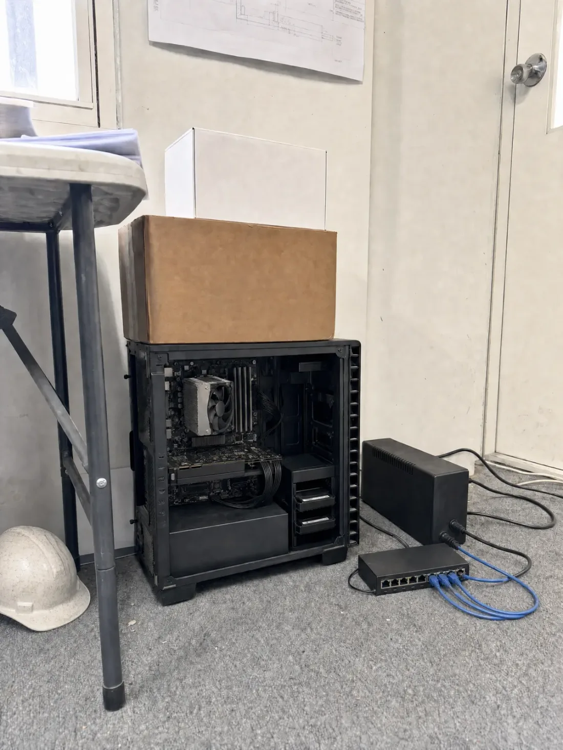 Open self-hosted AI server being configured in a construction project office